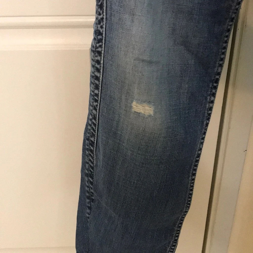 Calvin Klein distressed medium dark wash jeans 10